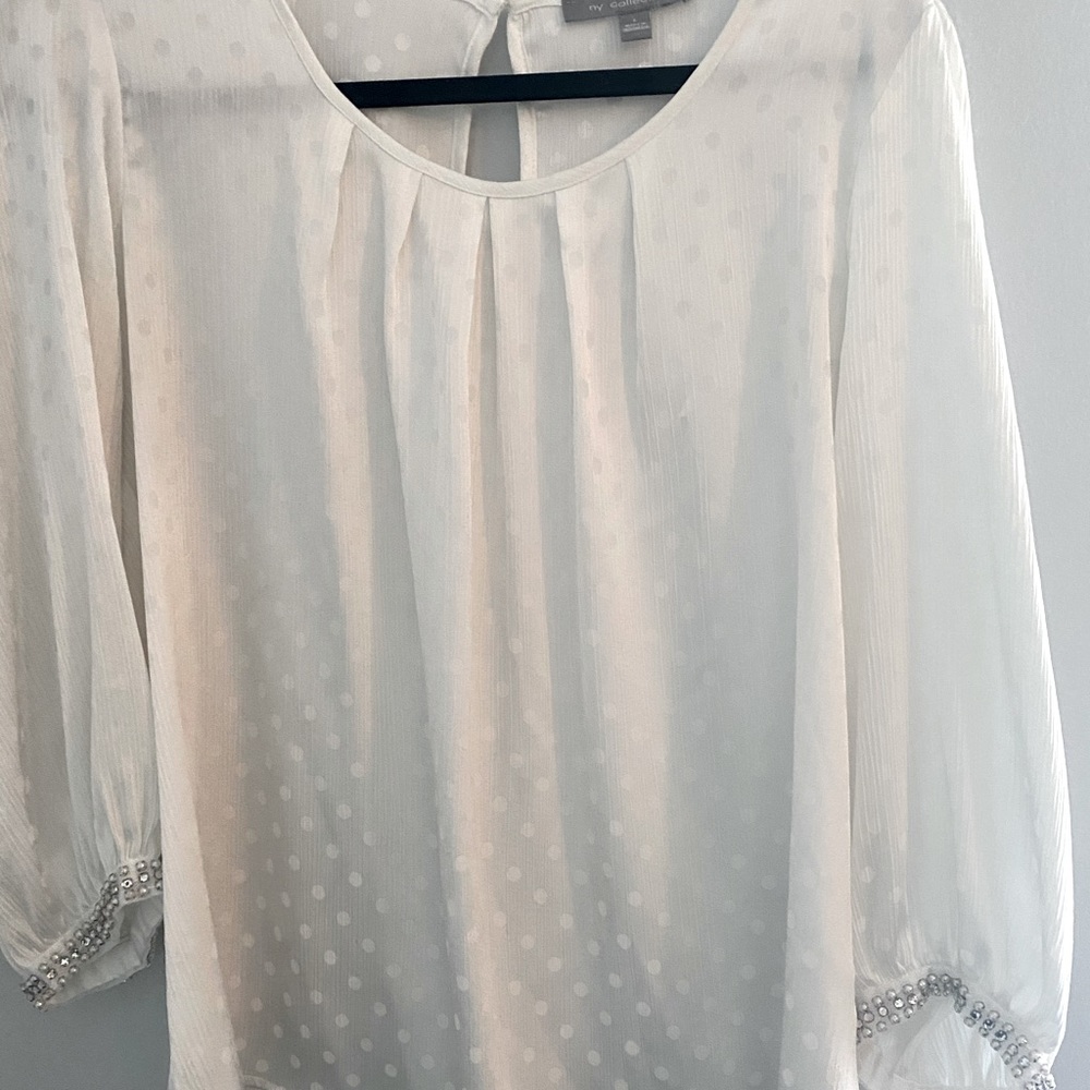 White silky material blouse